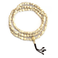 Буддийские четки 108 бусин в форме Черепа из кости морской раковины 8мм Буддийские четки 108 бусин в форме Черепа из кости морской раковины 8мм