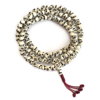 Буддийские четки 108 бусин из кости белые с резьбой Черепа круглые 10мм Буддийские четки 108 бусин из кости белые с резьбой Черепа круглые 10мм