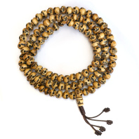 Буддийские четки 108 бусин из кости с резьбой Черепа круглые 10мм Буддийские четки 108 бусин из кости с резьбой Черепа круглые 10мм